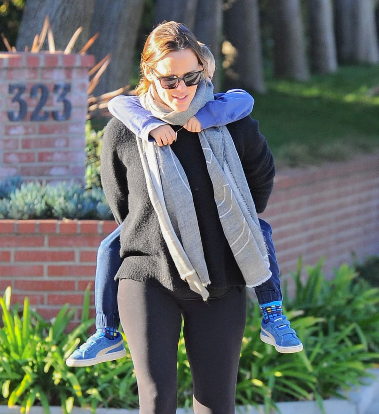 Photo © 2016 Fame Flynet USA/The Grosby Group EXCLUSIVE Los Angeles, November 30, 2016. Actress and busy mom Jennifer Garner was seen giving her son Samuel Affleck a piggy back ride while out and about in Los Angeles, California on November 30, 2016. She has been spending a great deal of time with her whole family, including Ben Affleck throughout this holiday season. They even booked Thanksgiving with their kids and had an enjoyable time.
