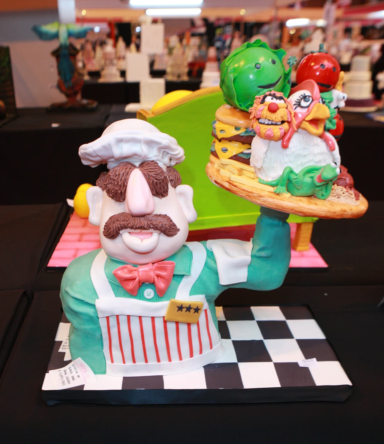 La competencia de pasteles mundial, Cake International, exhibió pasteles que llevan la decoración culinaria a lugares inesperados, con repostería en forma de personajes de películas, pájaros, perros y hasta un bebé. El show se llevará a cabo del 17 al 19 de marzo en Birmingham, Inglaterra.