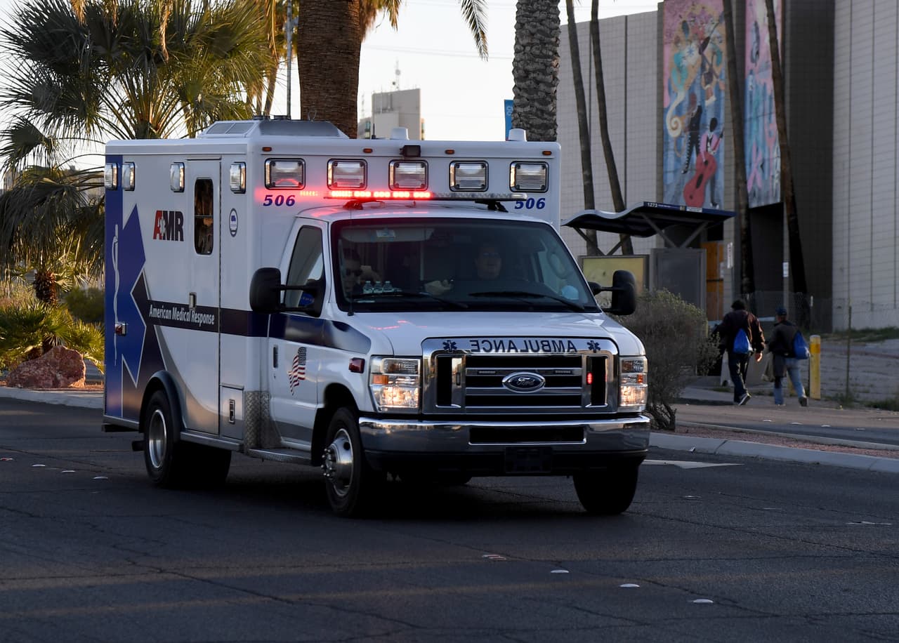 LAS VEGAS, NEVADA - MARCH 30: An American Medical Response (AMR) ambulance drives northbound on Las Vegas Boulevard on March 30, 2020 in Las Vegas, Nevada. The World Health Organization declared the coronavirus (COVID-19) a global pandemic on March 11th. (Photo by Ethan Miller/Getty Images)
