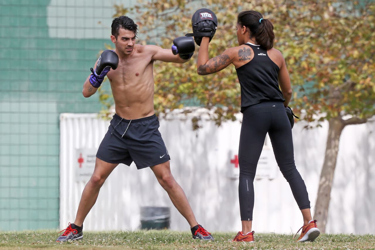 Aquí en acción con su entrenadora.