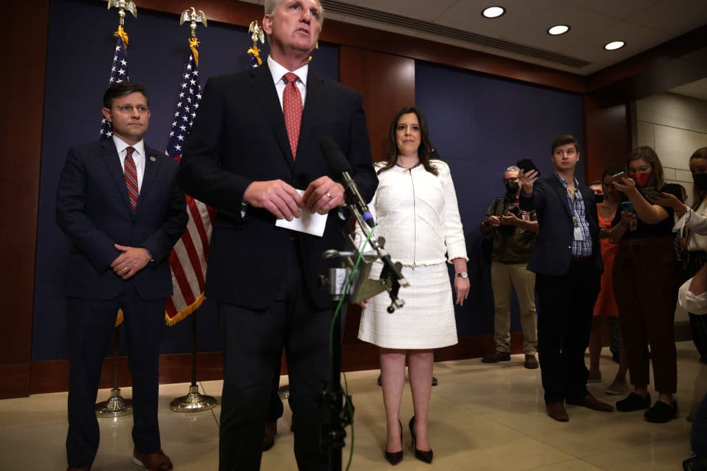 U.S. House Minority Leader Rep. Kevin McCarthy (R-CA) (2nd L) speaks to members of the press as Rep. Elise Stefanik (R-NY) (3rd L) and the newly elected House Republican Conference Vice Chair Rep. Mike Johnson (R-LA) (L) look on after an election for House Republican Conference chair at the U.S. Capitol Visitor Center May 14, 2021 on Capitol Hill in Washington, DC.