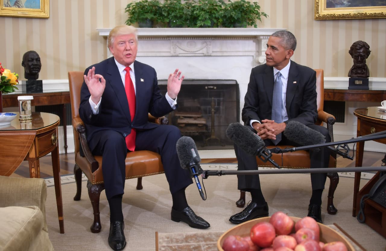 US President Barack Obama meets with Republican President-elect Donald Trump to update him on transition planning in the Oval Office at the White House on November 10, 2016 in Washington,DC. / AFP / JIM WATSON (Photo credit should read JIM WATSON/AFP/Getty Images)