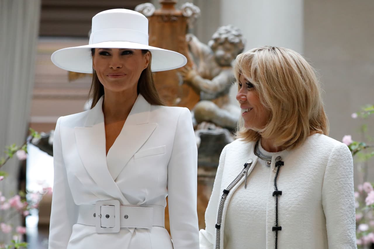 WASHINGTON, DC - April 24: First Lady Melania Trump and French first lady Brigitte Macron tour the National Gallery of Art on April 24, 2018 in Washington, DC. President Donald Trump is hosting French President Emmanuel Macron for the first state visit of his presidency. (Photo by Aaron P. Bernstein/Getty Images)
