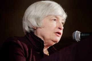 La Fed mantiene los tipos cercanos a cero y recorta su programa de estímulo