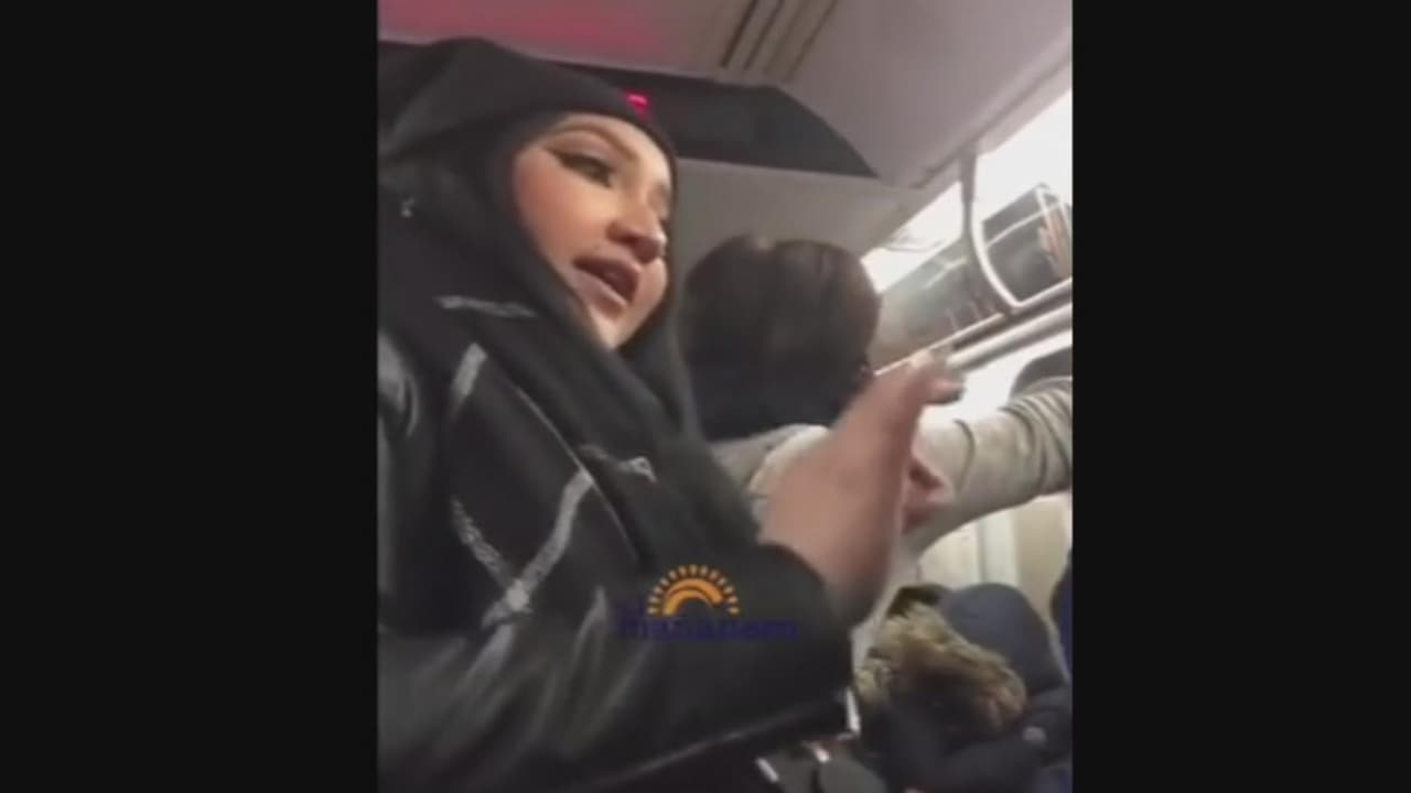 Hispanic woman defends 'Muslim Indian' passengers on New York City subway being harassed by another Latina