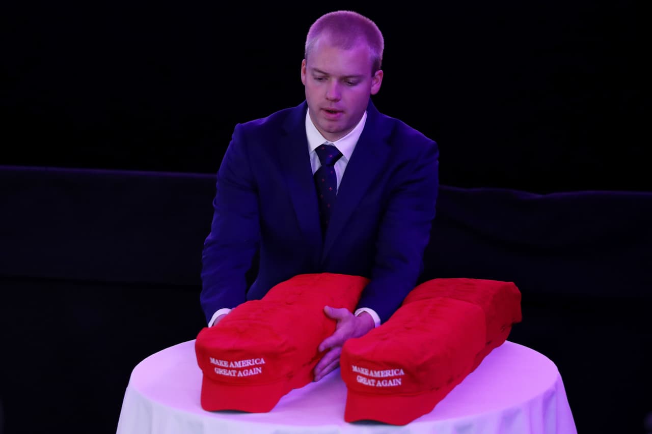 NEW YORK, NY - NOVEMBER 08: A worker prepares Republican presidential nominee Donald Trump memorabilia at the New York Hilton Midtown on November 8, 2016 in New York City. Americans today will choose between Republican presidential nominee Donald Trump and Democratic presidential nominee Hillary Clinton as they go to the polls to vote for the next president of the United States. (Photo by Joe Raedle/Getty Images)