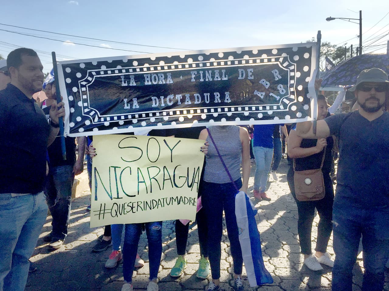 'The last hour of the dictatorship.' On Monday April 23, a massive march flooded Managua shouting "they were not criminals, they were students". Many protesters also demanded the resignation of President Daniel Ortega and his wife and Vice President Rosario Murillo, accusing them of creating a family dictatorship.