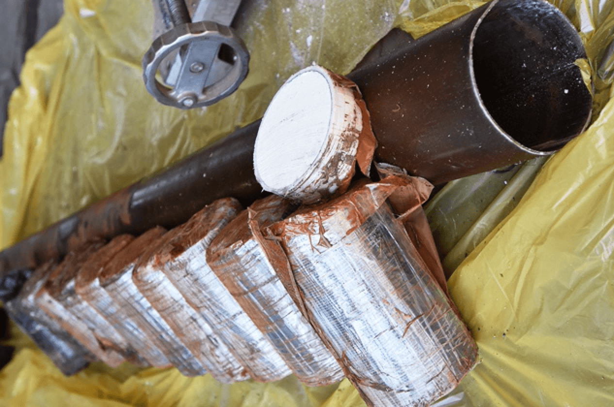 En el eje de un tráiler dos hispanos recibieron 2.3 millones de dólares en heroína
