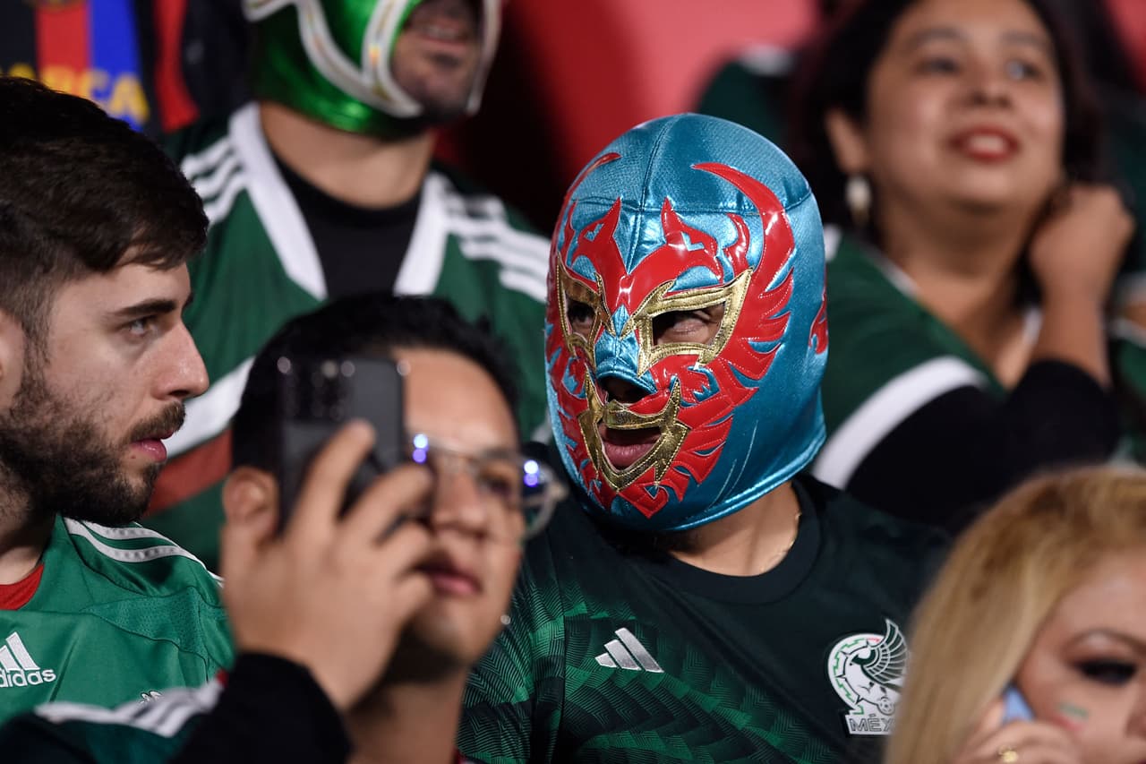 A Mexico's supporter watches during the friendly international football match between Mexico and Iraq at the Montilivi stadium in Girona, on November 9, 2022. (Photo by Josep LAGO / AFP) (Photo by JOSEP LAGO/AFP via Getty Images)