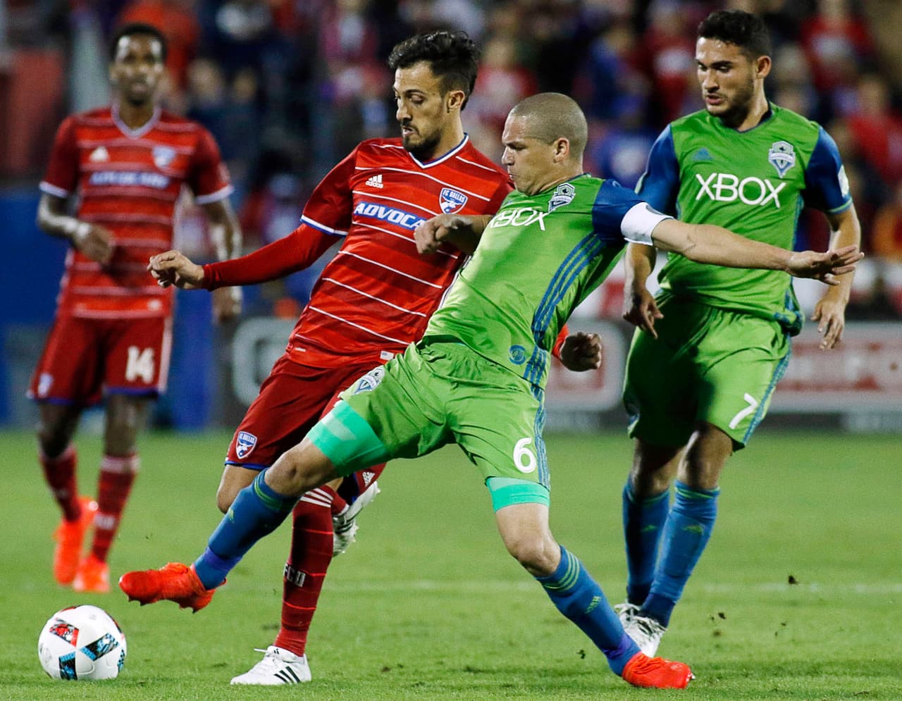Nov 6, 2016; Dallas, TX, USA; FC Dallas forward Maximiliano Urruti (37) and Seattle Sounders midfielder Osvaldo Alonso (6) battle for the ball at Toyota Stadium. Mandatory Credit: Ray Carlin-USA TODAY Sports