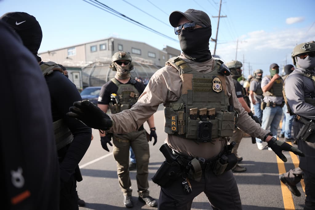 Federal immigration officers confront protesters outside Delaney Hall detention center Thursday, May 28, 2026, in Newark, N.J. (AP Photo/Angelina Katsanis)