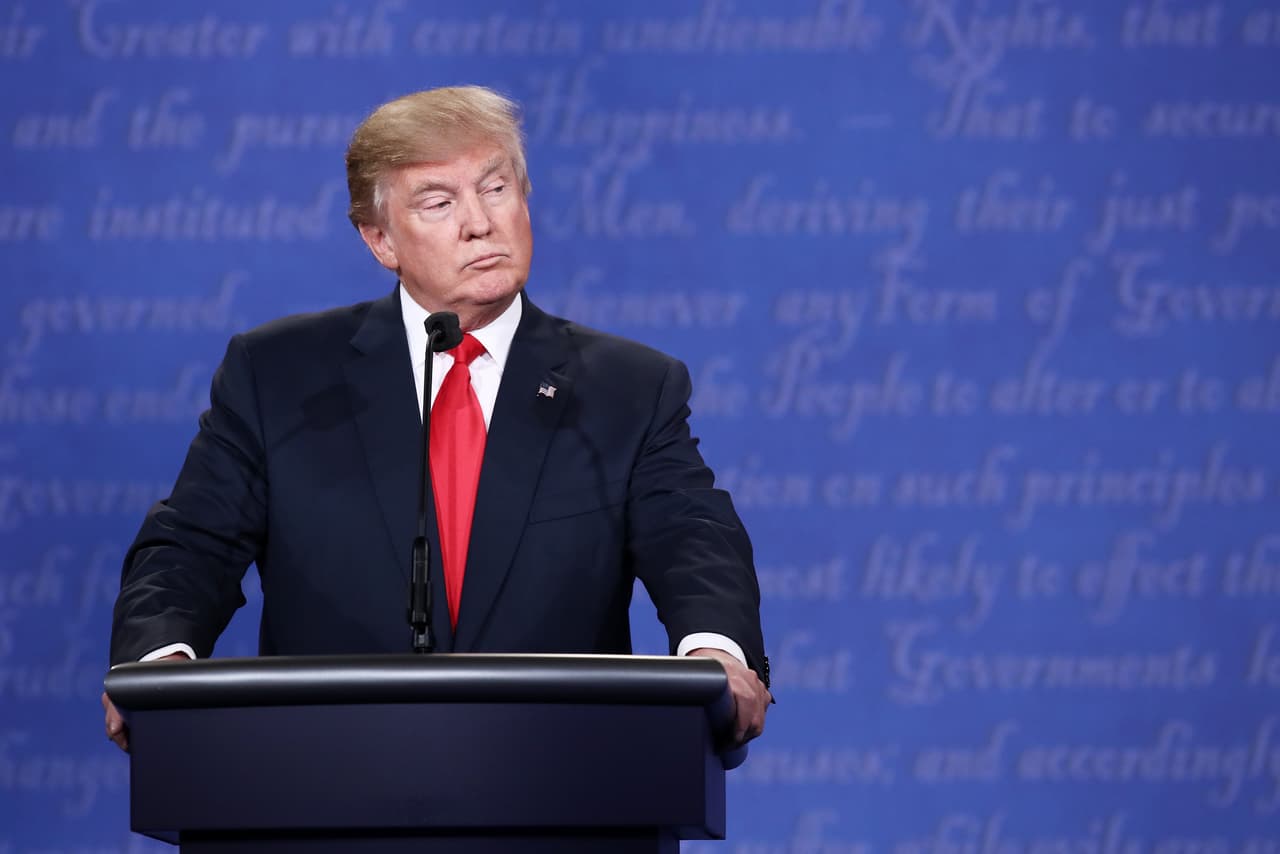 LAS VEGAS, NV - OCTOBER 19: Republican presidential nominee Donald Trump listens as Democratic presidential nominee former Secretary of State Hillary Clinton speaks during the third U.S. presidential debate at the Thomas & Mack Center on October 19, 2016 in Las Vegas, Nevada. Tonight is the final debate ahead of Election Day on November 8. (Photo by Win McNamee/Getty Images)