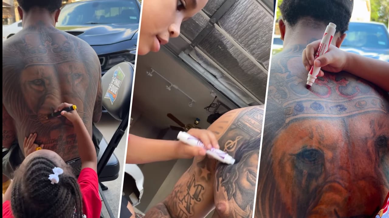 Ex jugador de la NCAA deja que su pequeña hija de color a sus tatuajes en video viral
