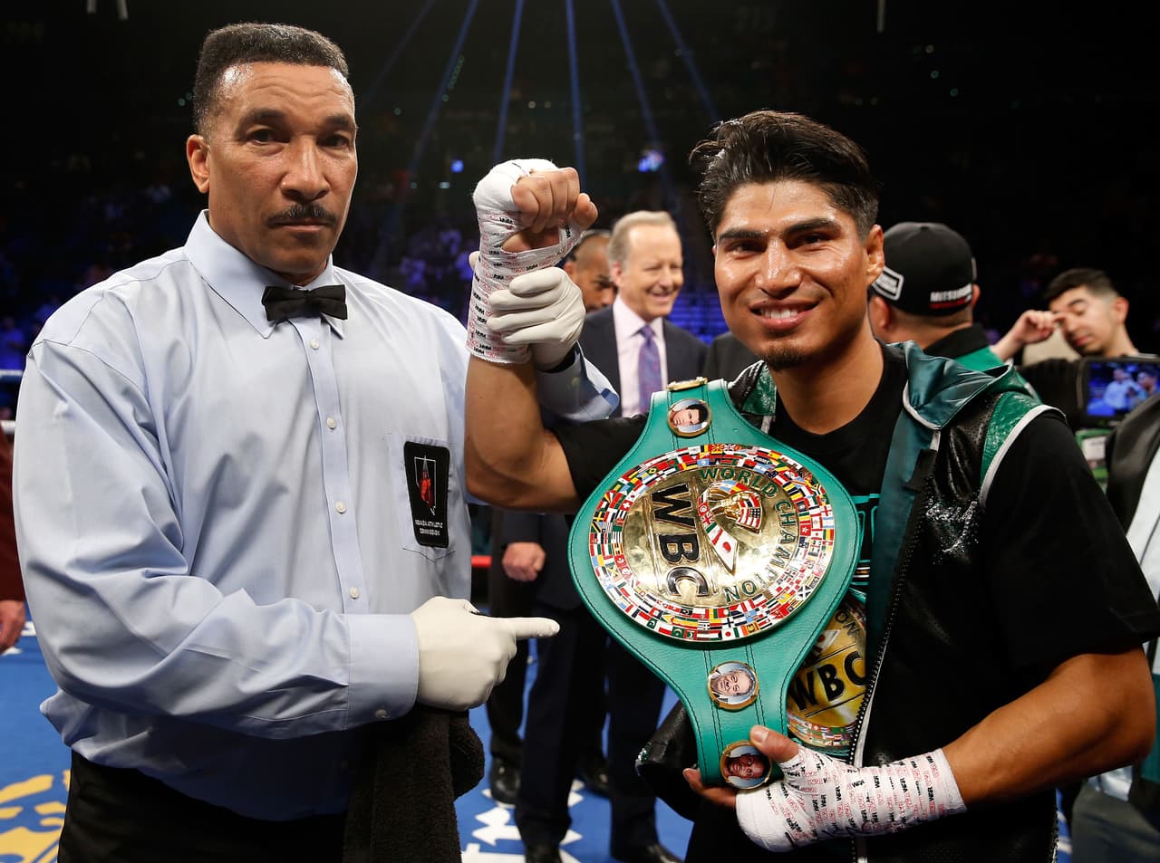 LAS VEGAS, NV - JANUARY 28: Mikey Garcia (R) poses with referee Tony Weeks after knocking out Dejan Zlaticanin in the third round to win the WBC lightweight title at MGM Grand Garden Arena on January 28, 2017 in Las Vegas, Nevada. (Photo by Steve Marcus/Getty Images)