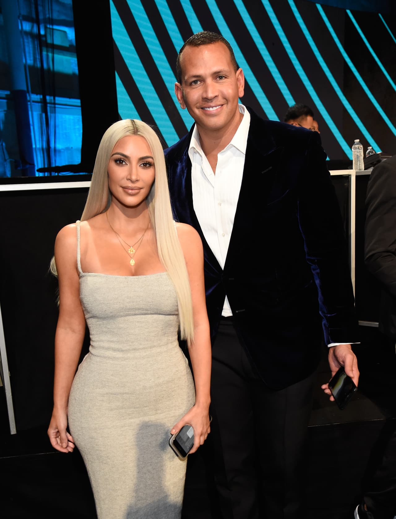 LOS ANGELES, CA - OCTOBER 14: In this handout photo provided by One Voice: Somos Live!, Kim Kardashian and Alex Rodriguez participate in the phone bank onstage during "One Voice: Somos Live! A Concert For Disaster Relief" at the Universal Studios Lot on October 14, 2017 in Los Angeles, California. (Photo by Kevin Mazur/One Voice: Somos Live!/Getty Images)