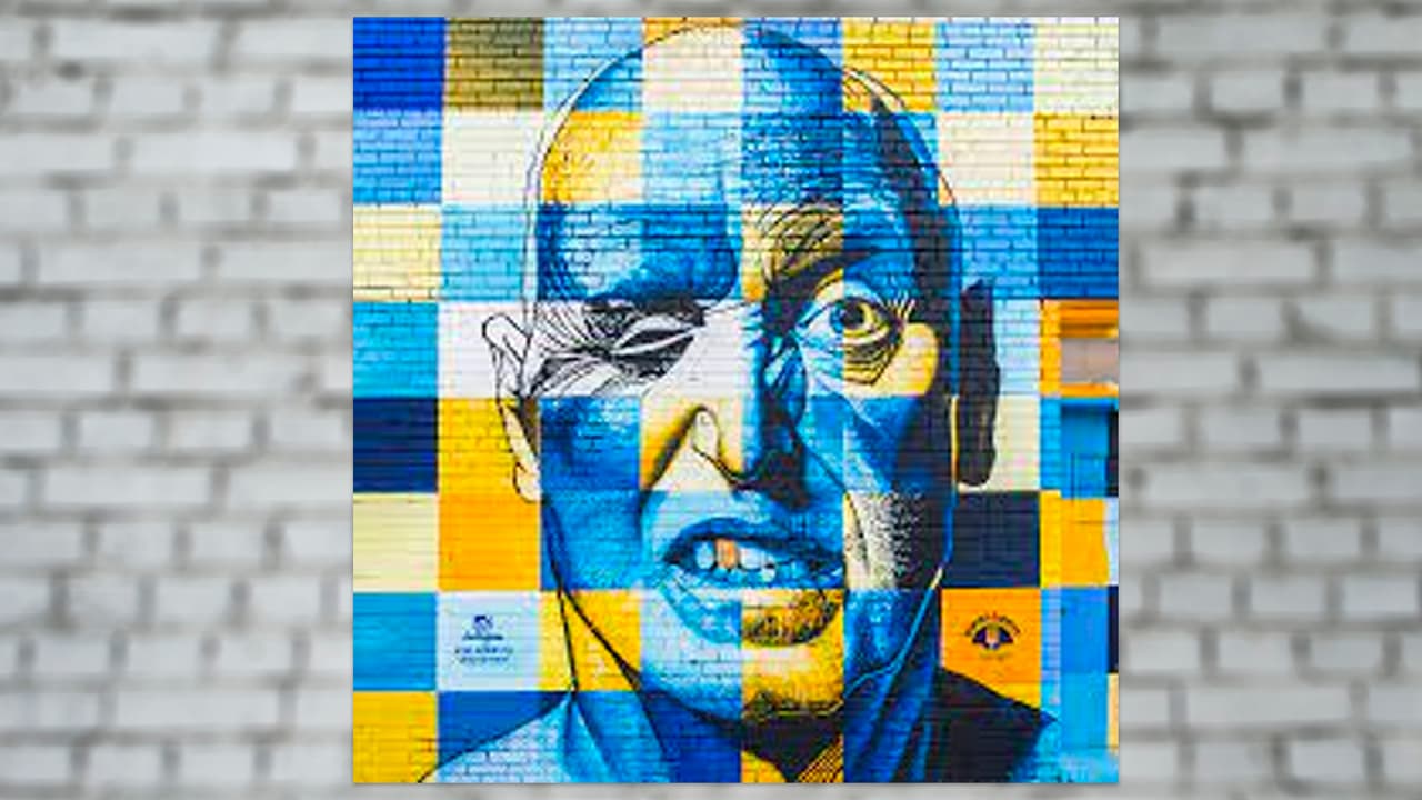 <b>Un mural que seguro querrás ver más de una vez</b>, mientras te mira a ti. Esta obra de Steven Hunter está lleno de colores y detalles. 
<br>📍 Lo puedes encontrar en el 
<b>2801 en Elm Street</b>.