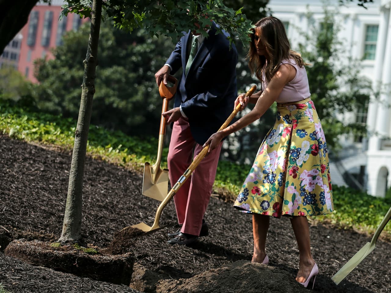 First lady Melania Trump center takes part in a tree planting ceremony on the south grounds of the White House August 27, 2018 in Washington, DC. The tree comes from the original Eisenhower Oak located near the Kennedy Garden that was excavated from the grounds earlier this year. Joining the first lady is Mary Jean Eisenhower, right, granddaughter of President Dwight Eisenhower and Richard Gatchell Jr., left, fifth generation grandson of President James Monroe. (Photo by Oliver Contreras/SIPA USA)