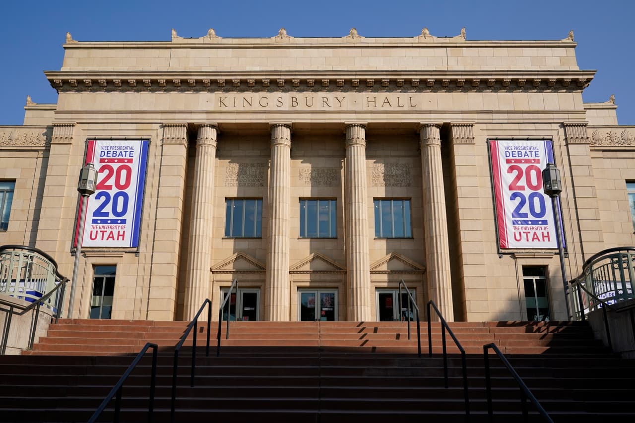 Banners hang from Kingsbury Hall at the University of Utah as preparations take place for the vice presidential debate between Vice President Mike Pence and Democratic vice presidential candidate, Sen. Kamala Harris, D-Calif., Wednesday, Oct. 7, 2020, in Salt Lake City. (AP Photo/Patrick Semansky)