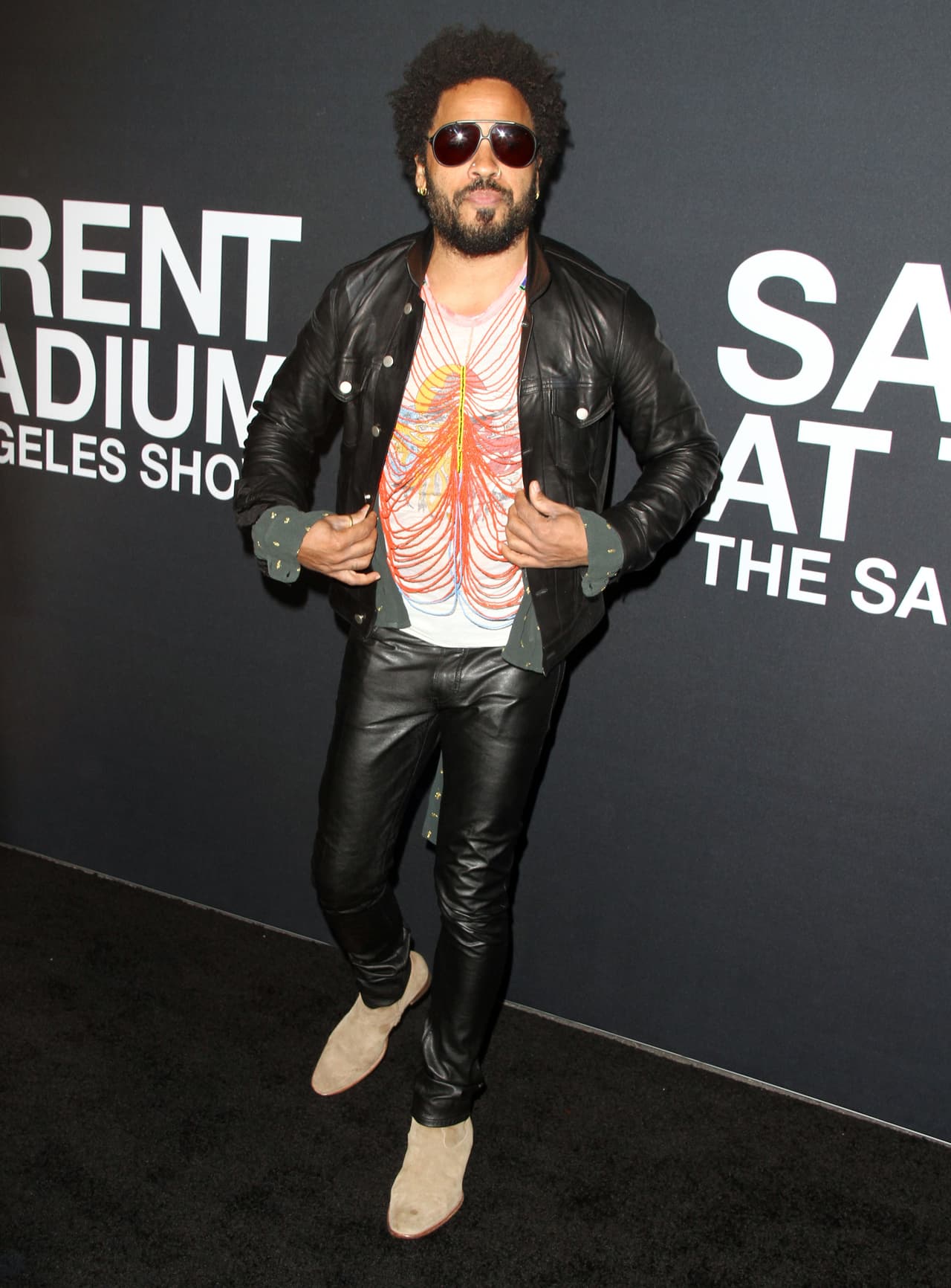 Por cierto, Lenny no pudo dejar de mostrar su lado más fashionista.