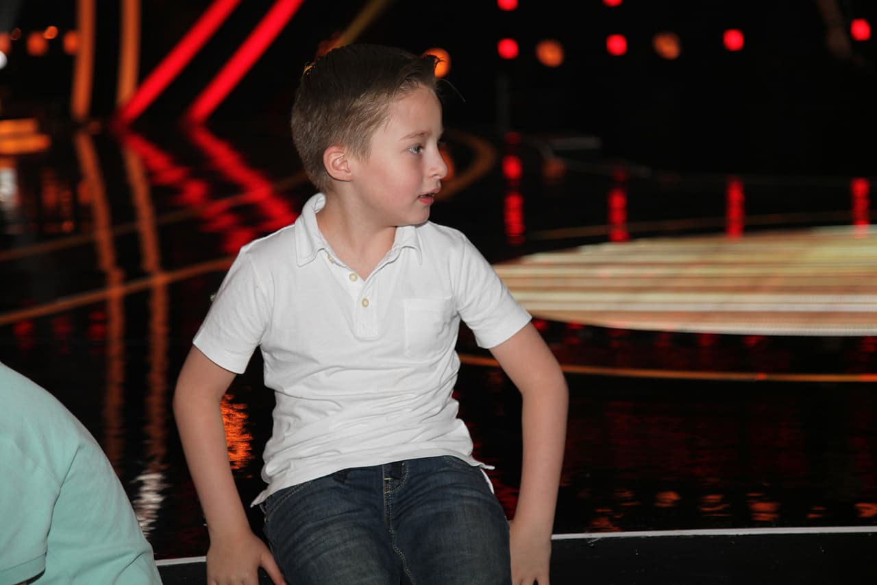 El niño de siete años fue el primero en hablar. No pudo evitar mostrar el inmenso amor que le tiene a su afamada madre.