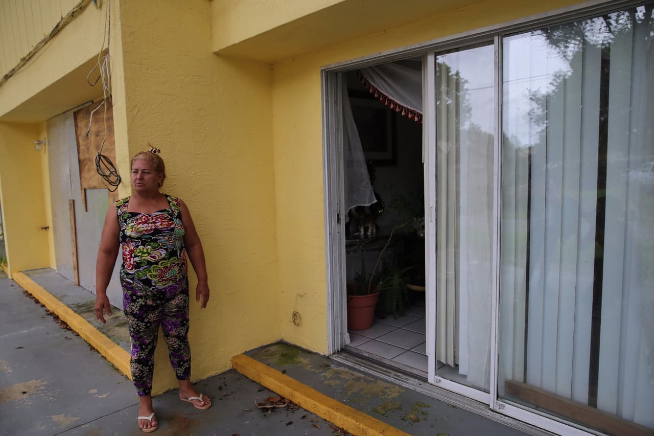 Regla Pino Hernández,a Cuban American outside her home in Naples.