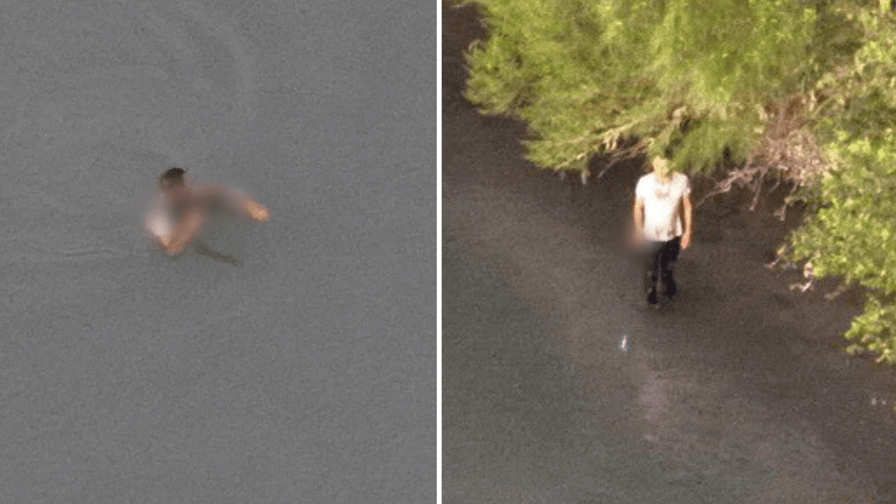 Un hombre con aparente arma guía a un grupo de inmigrantes por el Río Bravo en Texas