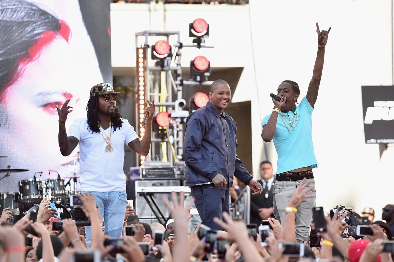 HOLLYWOOD, CA - APRIL 01: Rappers Wale, YG and Rich Homie Quan perform at Revolt Live Hosts Exclusive 'Furious 7' Takeover with Musical Performances From the Official Motion Picture Soundtrack at Revolt Live Studios on April 1, 2015 in Hollywood, California. (Photo by Alberto E. Rodriguez/Getty Images)