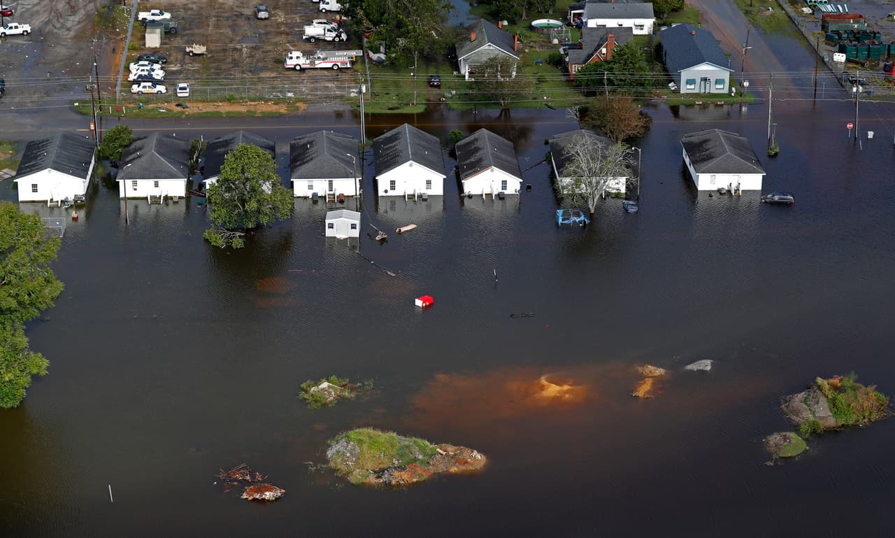 Floodwater from Hurricane Florence threatens homes in Dillon, S.C., Monday, Sept. 17, 2018. (AP Photo/Gerald Herbert)