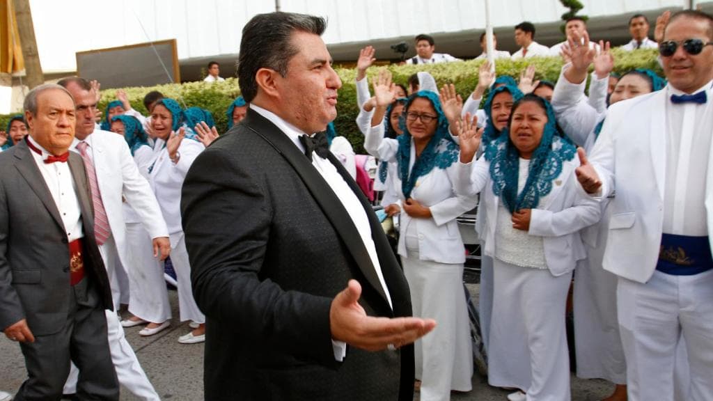 Naasón Joaquín García greetsworshippers at his Luz del Mundo church in Guadalajara, Mexico in 2018.