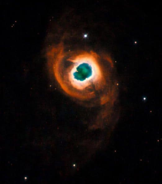 Una nube de colores de gas y polvo, de una nebulosa llamada Knockout 4-55 (o K 4-55).