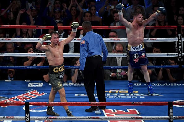 LAS VEGAS, NV - SEPTEMBER 16: (L-R) Gennady Golovkin and Canelo Alvarez both celebrate after the final round in their WBC, WBA and IBF middleweight championship bout at T-Mobile Arena on September 16, 2017 in Las Vegas, Nevada. (Photo by Ethan Miller/Getty Images)