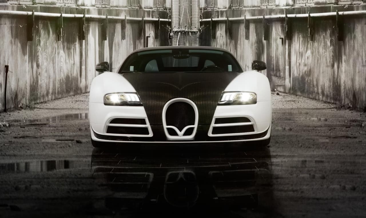 <h3 class="cms-h3-H3"><b>Bugatti Veyron by Mansory Vivere</b></h3>
<br>Precio: 3.4 millones de dólares
<br>Motor: W16 8.0 litros de 1,200 hp y 1,106 lb-pie de torque.
<br>Características: la casa de tuning extremo Mansory no pudo dejar pasar la ocasión de darle su toque al Bugatti. En la carrocería predomina el uso de fibra de carbono y eso lo hace lucir aún más imponente.
<br>