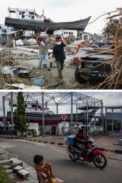 Las personas desplazadas por los tsunamis, caminan en su barrio en ruinas el 4 de enero de 2005 en Banda Ace. Ahora lo único que permanece en el mismo sitio es un barco varado.
