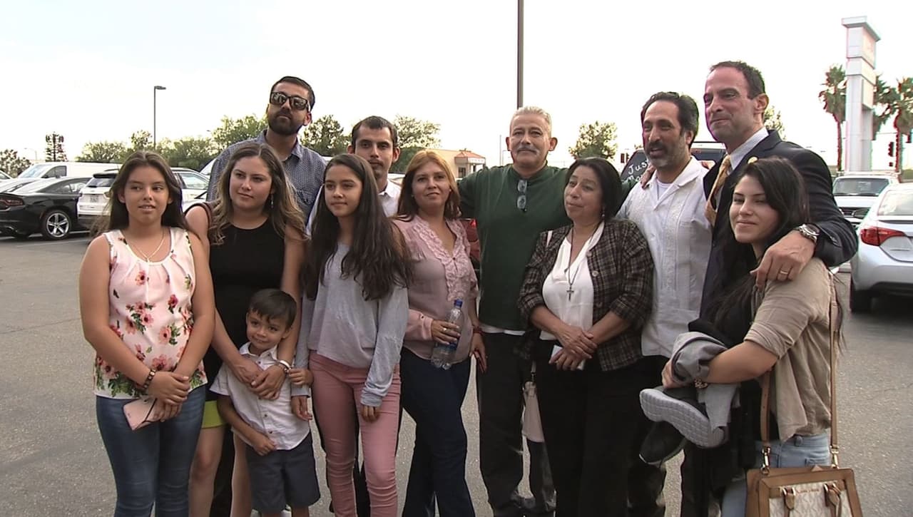 The Avélica family and friends. (Rómulo at center in green pullover.)