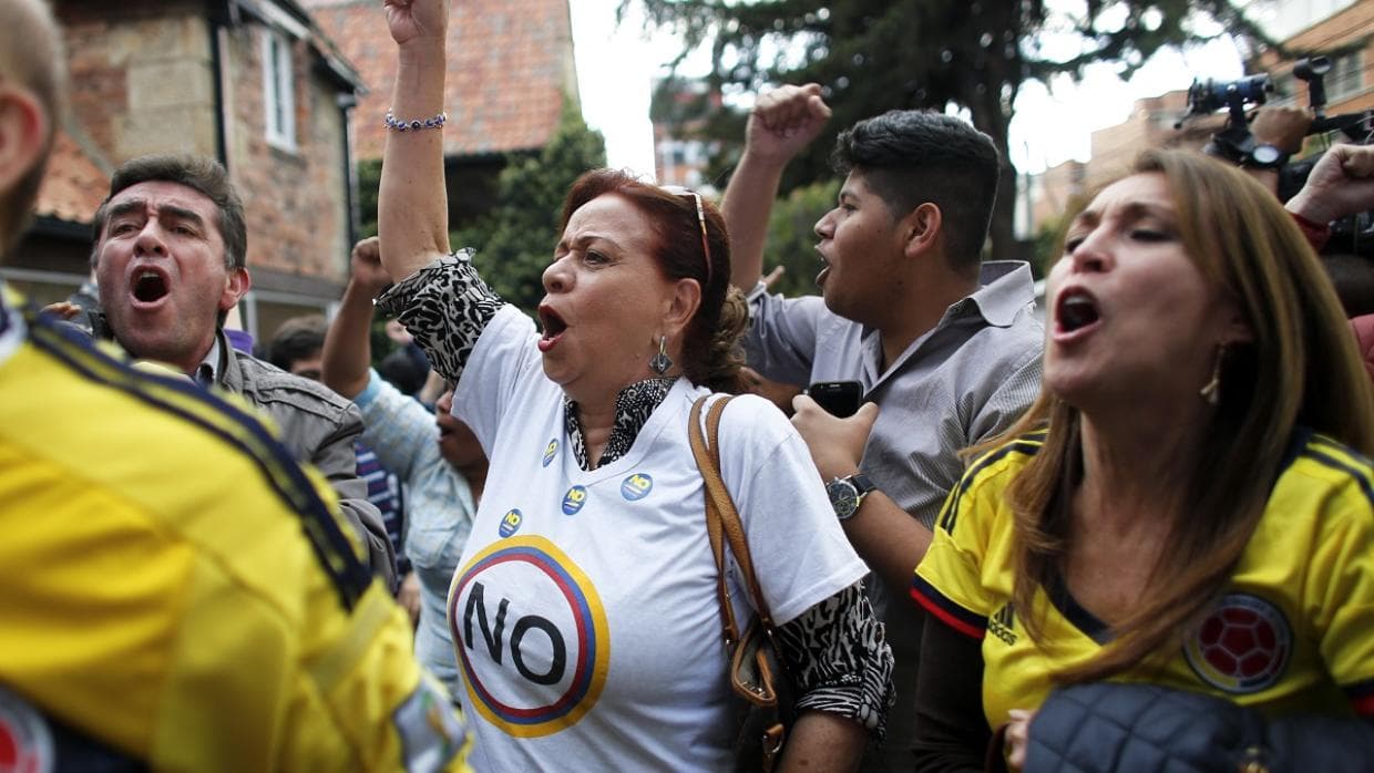 Colombians narrowly reject peace deal with FARC rebels