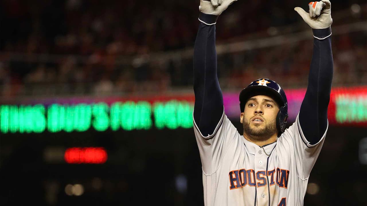 George Springer celebra luego de conectar un jonrón de dos carreras para poner el 7-1 definitivo en el quinto juego de la Serie Mundial.