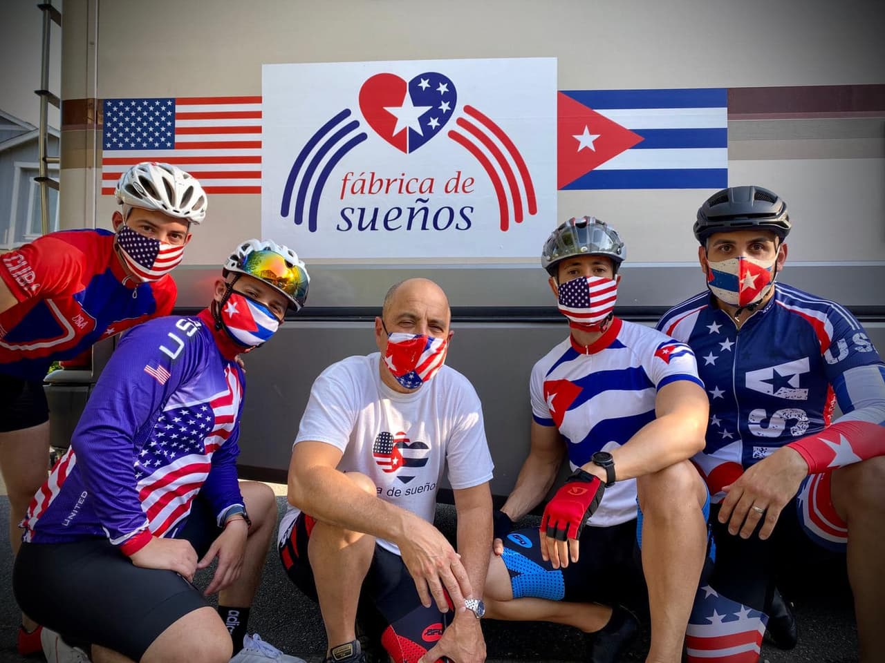 Cuban-American teacher, Carlos Lazo, with his two sons and two nephews during their 3,000-mile bike ride across the United States in 2020, from Seattle to Washington DC. to advocate for lifting economic sanctions with Cuba.