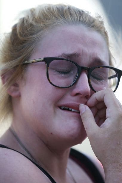 Luego de un tiroteo en una iglesia local que dejó a nueve muertos, la ciudad de Charleston permanecía en duelo este jueves.
