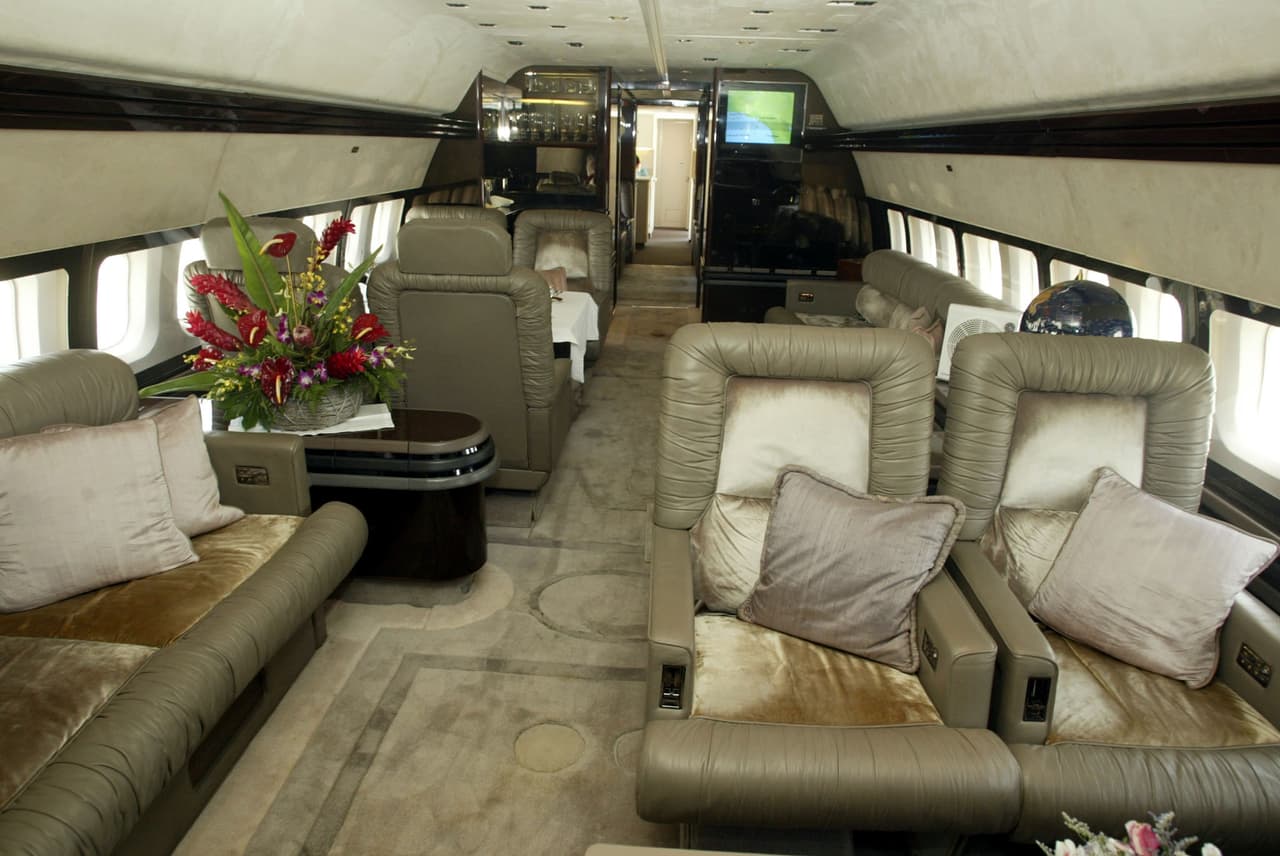 Este Boeing 707 fue construido en 1964 y utilizado principalmente para cubrir las rutas de Australia a Asia y de Norteamérica a Suramérica. En diciembre de 1998, Travolta lo adquirió y los registró como N707JT (JT por sus iniciales). El actor lo utilizó para recorrer el mundo como parte de promociones para la aerolínea, así también lo pilotó en misiones humanitarias a zonas de desastre como Nueva Orleans y Haití.