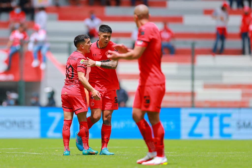 TOLUCA, MEXICO - APRIL 03: Valber Huerta of Toluca celebrates with teammates after scoring his team’s second goal during the 12th round match between Toluca and Puebla as part of the Torneo Grita Mexico C22 Liga MX at Nemesio Diez Stadium on April 03, 2022 in Toluca, Mexico. (Photo by Hector Vivas/Getty Images)