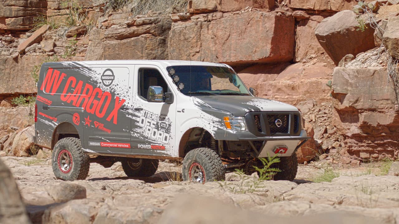 The Nissan NV Cargo X project vehicle, arguably the most extreme version of Nissan Commercial Vehicles’ flagship NV Cargo van ever created, was built in partnership with legendary off-road builder Ian Johnson. The NV Cargo X stands over seven-and-a-half feet tall on 37-inch tires and is powered by a Cummins® 5.0L V8 Turbo Diesel transplanted from a Nissan TITAN XD full-size pickup.
