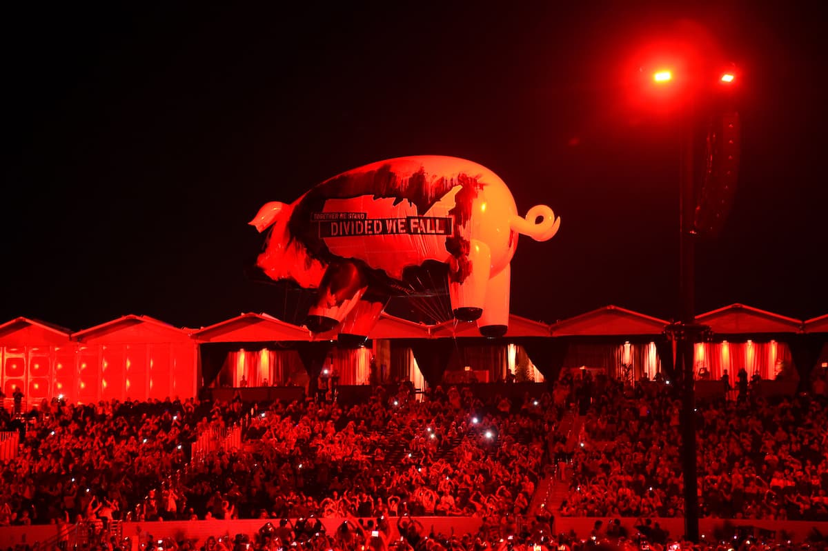 INDIO, CA - OCTOBER 09: "Divided We Fall" Pig floats over the audience during the Roger Waters performance at Desert Trip at The Empire Polo Club on October 9, 2016 in Indio, California. (Photo by Kevin Mazur/Getty Images for Desert Trip)