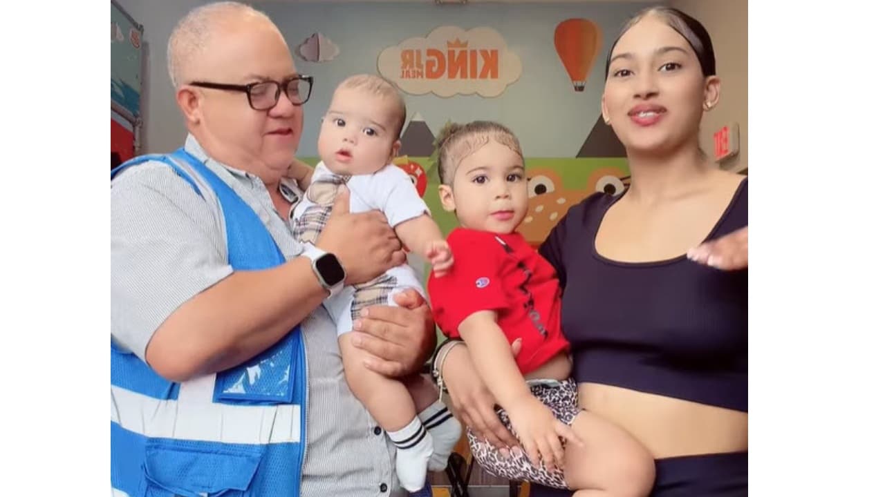 Guillersis, Manny Maldonado y sus dos hijos.