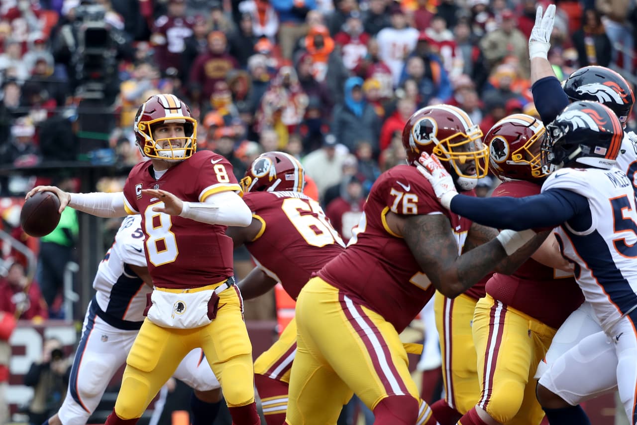 Kirk Cousins lanzó para 299 yardas y tres anotaciones.