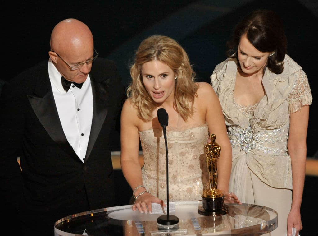 LOS ANGELES, CA - FEBRUARY 22: (EDITORS NOTE: NO ONLINE, NO INTERNET, EMBARGOED FROM INTERNET AND TELEVISION USAGE UNTIL THE CONCLUSION OF THE LIVE OSCARS TELECAST) Kate Ledger (C), sister of late Heath Ledger, accepts the award for Best Supporting Actor for "The Dark Night" with father Kim (L) and mother Sally (R) during the 81st Annual Academy Awards held at Kodak Theatre on February 22, 2009 in Los Angeles, California. (Photo by Kevin Winter/Getty Images)