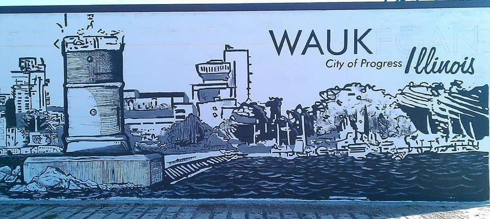 El mural "Ciudad de progreso" fue diseñado por la artista Cara Dunning y pintado por voluntarios. Este mural se encuentra justo al oeste de la esquina Grand y la Lewis. El mural fue creado como una bienvenida a la ciudad y un recordatorio de que está avanzando, trabajando en su desarrollo económico así como en los parques del área. Las palabras “Ciudad de progreso” o “City of Progress” también son parte del logo oficial de la ciudad.