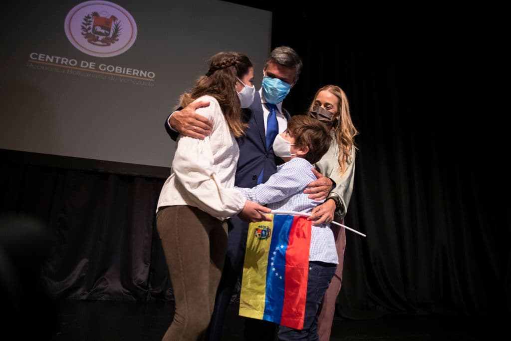 Venezuela opposition leader Leopoldo López hugs his daughter Manuela, his son Leopoldo and his wife Lilian Tintori during a press conference in Madrid on October 27, 2020 in Madrid, Spain.