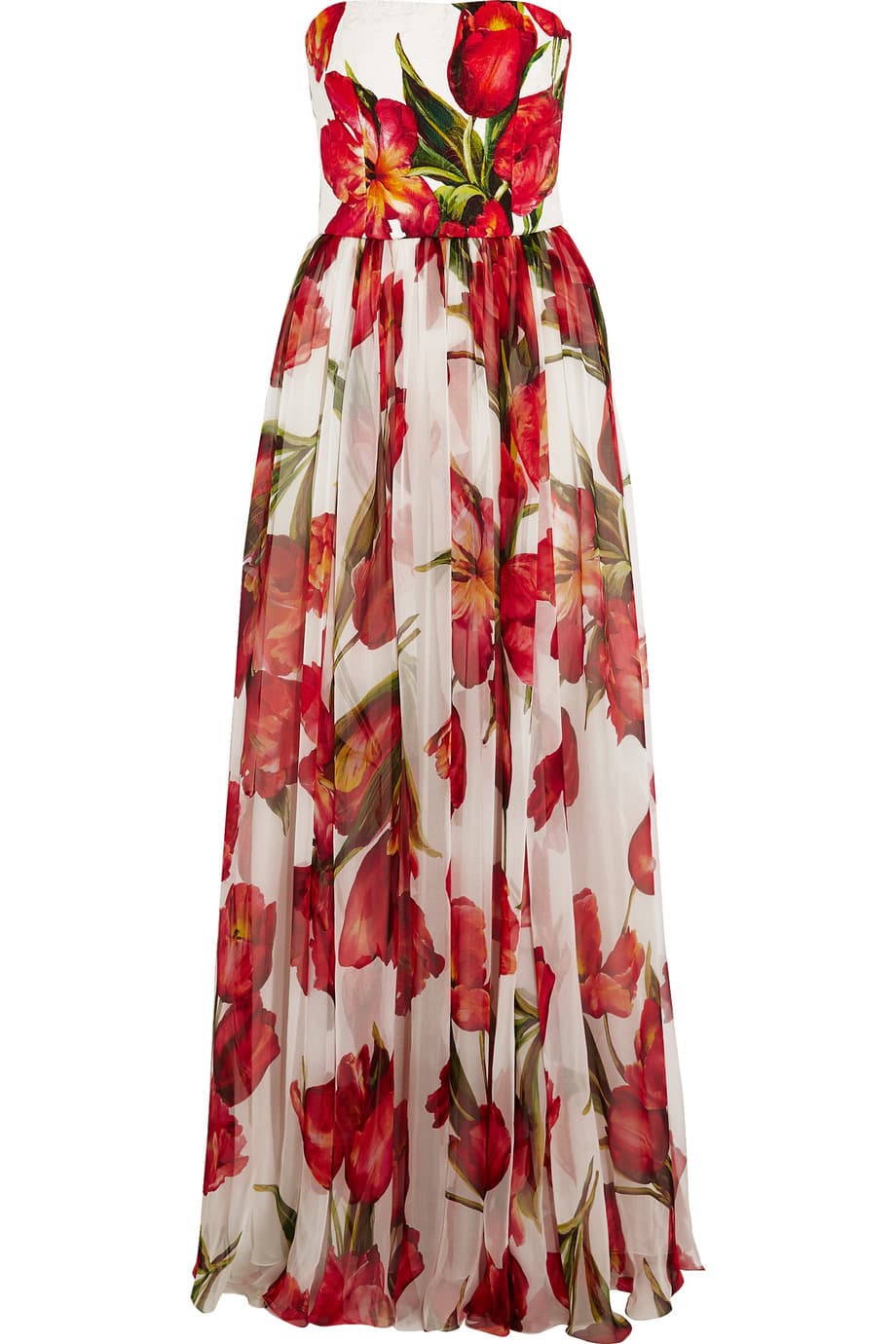 La primavera tiene siempre una prenda emblemática: el 'maxi dress' floral. Búscala de un buen material y de colores que no pasen tan fácilmente de moda, porque este vestido te acompañará varias temporadas. (Dolce & Gabbana)