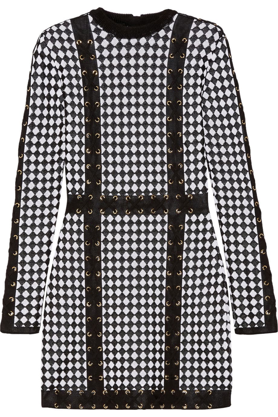 Si los 'polka dots' tradicionales te parecen muy obvios, busca algo que juegue con los puntitos y cree una textura interesante, pero de cualquier manera ten algo con este diseño en tu armario. (Balmain)