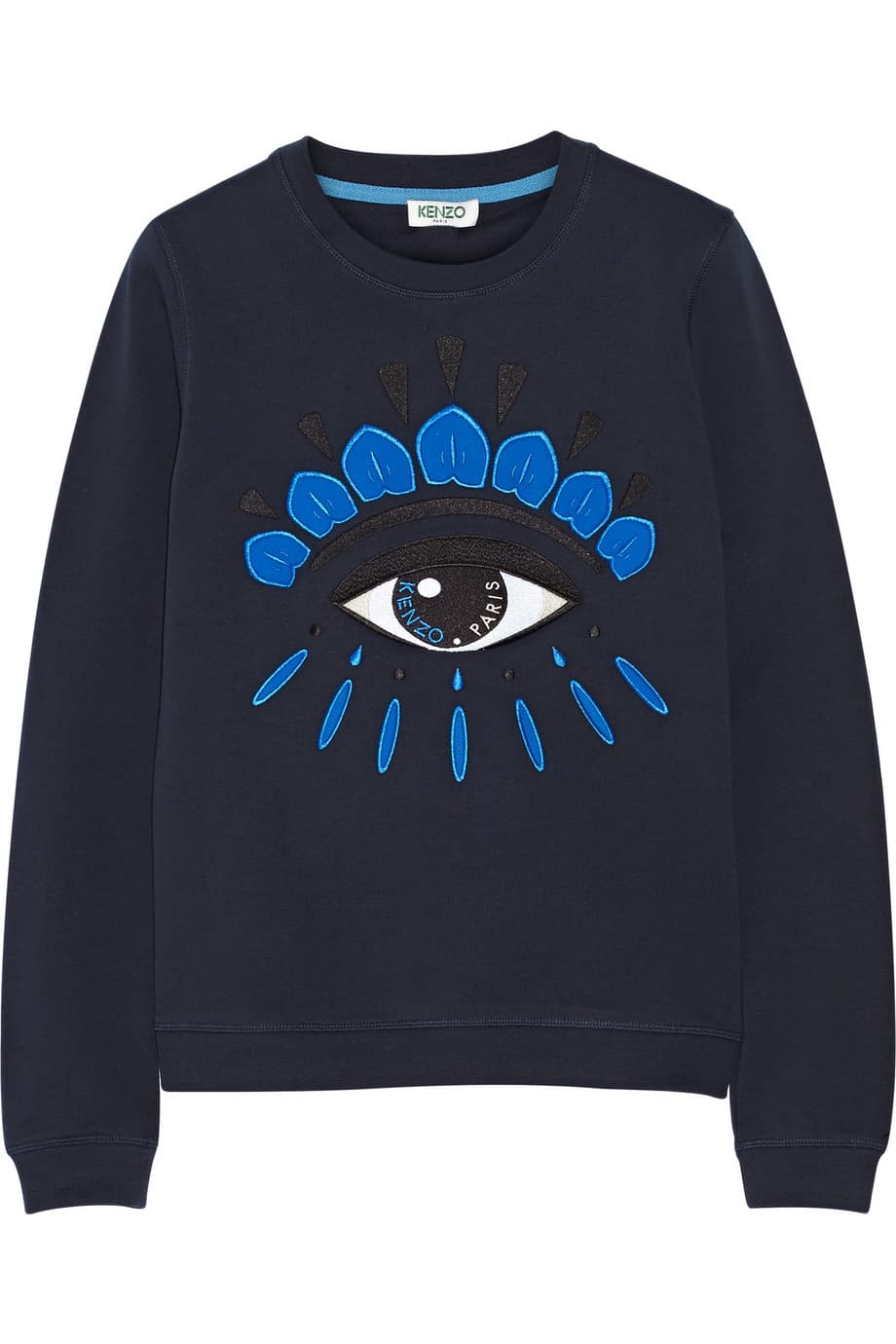 ¿Una sudadera? sí, aunque pensaras que era uno de esos pecados de moda, en verdad esta es una prenda que con las nuevas tendencias se puede llevar con prendas formales y cobrar una nueva vida. (Kenzo)